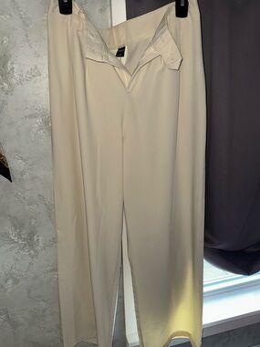 High-Rise Wide-Leg Trousers in Cream